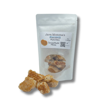 A white resealable bag labeled Freeze-Dried Stroopwafel Pieces – Crispy, Caramelized Dutch Cookie Crunch is shown with golden-brown cookie pieces and caramelized syrup displayed in front on a white background.